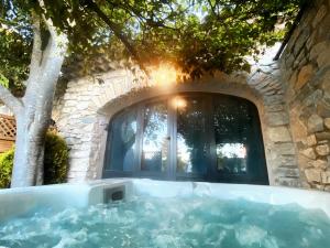 LAmourier en Cévennes, suites romantiques avec Jacuzzi privatif ou baignoire ronde Terrazzo