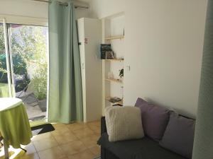 Appartements Rez de jardin cosy avec terrasse fleurie : photos des chambres