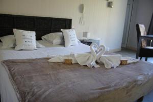 Hotels Hotel de La Beauronne : photos des chambres