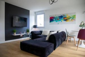 Appartements LES 2 LIONS moderne confort proche transports : photos des chambres