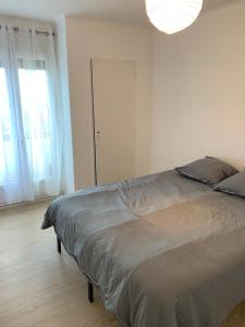 Appartements Appartement le 48 : photos des chambres