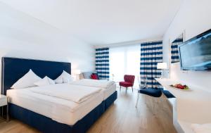 Deluxe Double Room with Balcony and Lake View room in Werzer's Hotel Resort Pörtschach