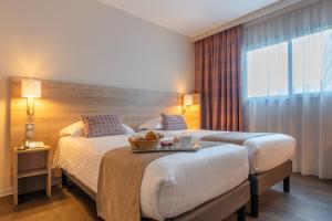 Hotels Hotel L'Empreinte : photos des chambres
