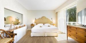 Hotels Relais & Chateaux Hotel La Reserve : photos des chambres