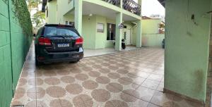 Casa na praia de Bertioga com Pscina e Churrasqueira - até 10 Pessoas