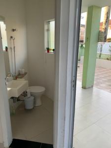 Casa na praia de Bertioga com Pscina e Churrasqueira - até 10 Pessoas