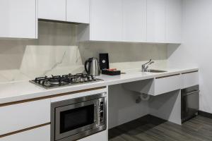 One Bedroom Accessible Suite room in Meriton Suites Chatswood
