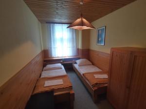 Twin Room with Shared Bathroom room in Hostel pod Voglom
