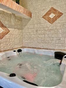 Maisons d'hotes Suite Privative Jacuzzi Sauna de la Villa Del Castagnol : photos des chambres