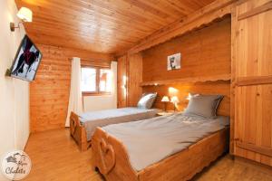 Maisons de vacances 2AlpesChalets - Chalet Marie 1 - Standing et Sauna aux pieds des pistes : photos des chambres