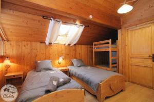 2AlpesChalets - Chalet Marie 2 - Standing et Sauna aux pieds des pistes : photos des chambres