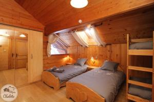 2AlpesChalets - Chalet Marie 2 - Standing et Sauna aux pieds des pistes : photos des chambres