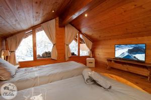 2AlpesChalets - Chalet Marie 2 - Standing et Sauna aux pieds des pistes : photos des chambres