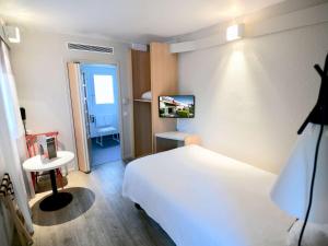 Hotels Ibis Nantes la Beaujoire Parc Expo : photos des chambres