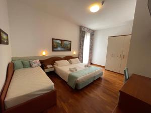 Family Room with Balcony room in Hotel Meridiana