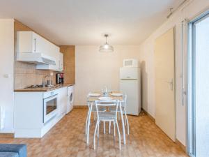 Apartment Les terrasses de la Plage-4 by Interhome