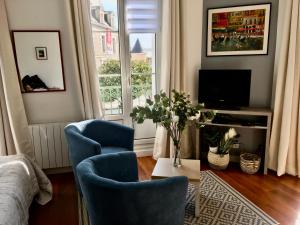 Appartements STUDIO BALCON DE LA PLACE : photos des chambres