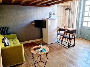 Appartements Meubles de l'Arsenal coeur de ville ! : photos des chambres