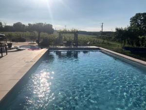 Maisons de vacances La Petite maison de Celine & Frederic avec piscine a Prehy : photos des chambres