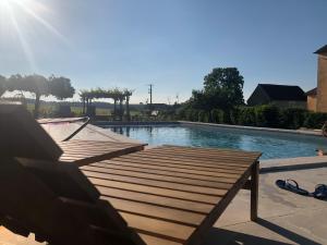 Maisons de vacances La Petite maison de Celine & Frederic avec piscine a Prehy : photos des chambres