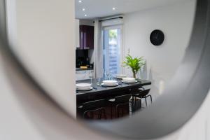 Appartements La Villetta G Riedisheim - appartement de Standing : photos des chambres