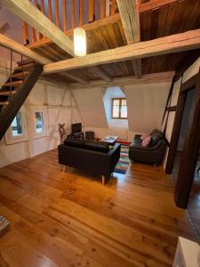 Appartements Les Epicuriens du Rempart : photos des chambres