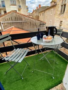 BALCON SUR LE MONDE - T2 COEUR DE VILLE