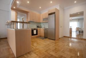 Upscale Luxury Athens Renovated Dream Home in One of the most Favorable Locations by National Gardens, Zoo & Hellenic Parliament in Syntagma and Stylish Exquisite Kolonaki neighborhood