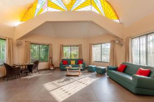 Morning Dew Retreat by StayVista - Modern interiors, Indoor games, Lush greenery, Pool & Gazebo await your escape