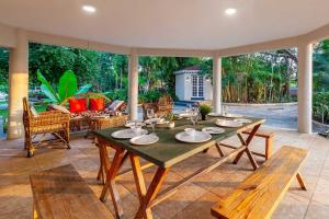 Morning Dew Retreat by StayVista - Modern interiors, Indoor games, Lush greenery, Pool & Gazebo await your escape