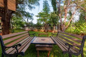 Morning Dew Retreat by StayVista - Modern interiors, Indoor games, Lush greenery, Pool & Gazebo await your escape