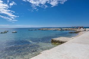 Beachfront Apartments Tolo with Pool