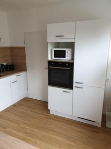 Ferienwohnung Voelker, wenige Schritte zum Meer, WLAN, 3 SZ, Kinder geeignet, Sackgasse, Horumersiel - Nordsee, Erdgeschoss