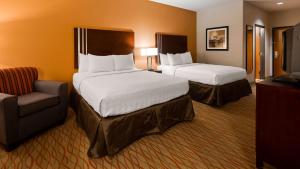 Queen Room with Two Queen Beds and Kitchenette room in Best Western Plus Spring Inn & Suites
