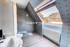 Maisons de vacances MD52 - Charmante maison avec jardin et stationnement : photos des chambres