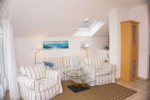 Balkon mit traumhaften Meerblick, gratis Nutzung vom AHOI Erlebnisbad und Sauna in Sellin Dünenhaus FeWo05