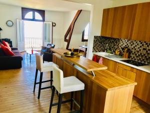 Appartements La Madelon Front de mer : photos des chambres