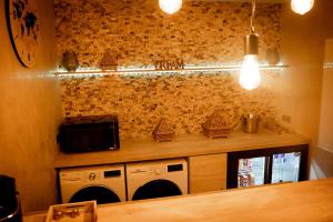 Appartements LE LOFT A BULLES (85m2 Jacuzzi Hammam Billiard Bar Douche Sauna) : photos des chambres