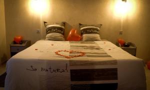 Appartements LE LOFT A BULLES (85m2 Jacuzzi Hammam Billiard Bar Douche Sauna) : photos des chambres
