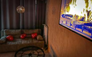 Appartements LE LOFT A BULLES (85m2 Jacuzzi Hammam Billiard Bar Douche Sauna) : photos des chambres
