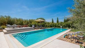 Luxury beachfront VILLA FLORES heated outdoor, indoor pool, whirlpool, sauna