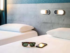 Hotels ibis budget Montpellier Sud Pres d'Arenes : photos des chambres