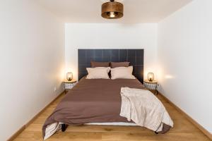 Appartements Duplex de 80m2 dans un village de caractere ! : photos des chambres