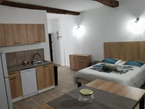 Appartements studio cosy centre ville : photos des chambres