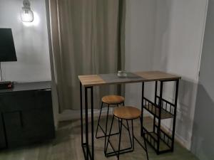 Appartements studio cosy centre ville : photos des chambres