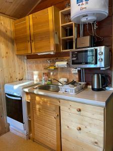 Fenyőtoboz kulcsosház