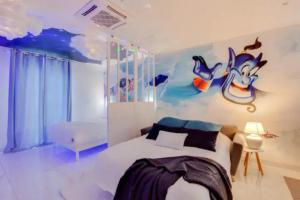 Appartements Suite Aladdin - 4P - Proche Disney : photos des chambres