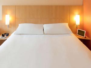 Hotels Ibis Roanne Le Coteau Hotel Restaurant : photos des chambres