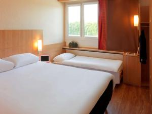 Hotels Ibis Roanne Le Coteau Hotel Restaurant : photos des chambres