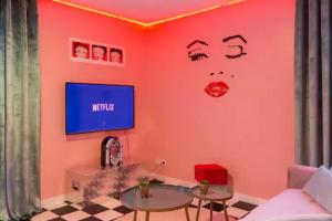 Appartements Suite Marilyn Monroe & SPA - 5P - Proche Disney : photos des chambres